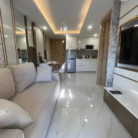 Romantic Beach Apartment芭堤雅水系高档酒店式公寓可做饭 Джомтьен Экстерьер фото