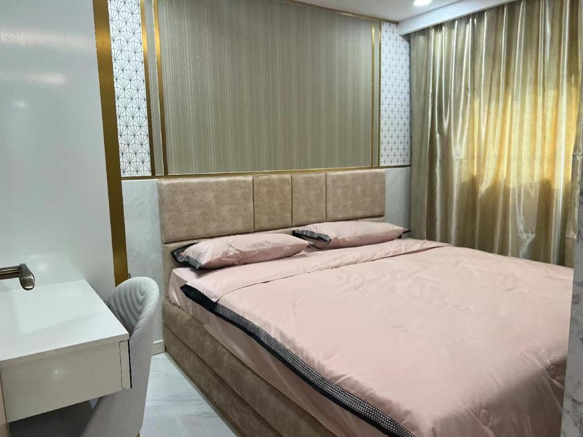 Romantic Beach Apartment芭堤雅水系高档酒店式公寓可做饭 Джомтьен Экстерьер фото