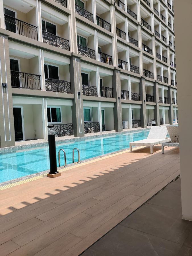 Romantic Beach Apartment芭堤雅水系高档酒店式公寓可做饭 Джомтьен Экстерьер фото